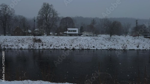 Snowy day in Rosendale New York, on the banks of the Rondout Creek, during a nor'easter photo