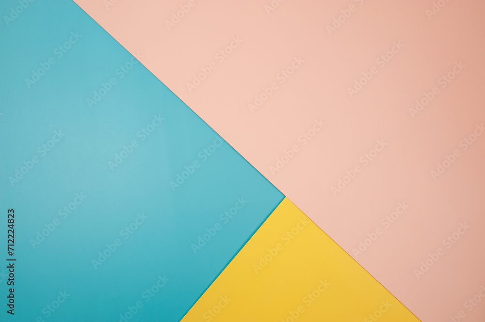 Blue, pink and yellow background. Colourful wallpaper.