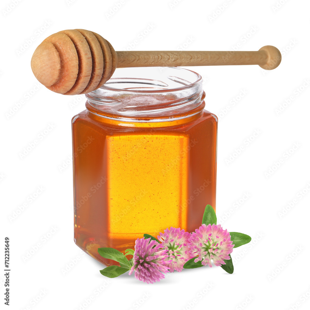 Honey in glass jar, dipper and clover flowers isolated on white Honey in glass jar, dipper and clover flowers isolated on white