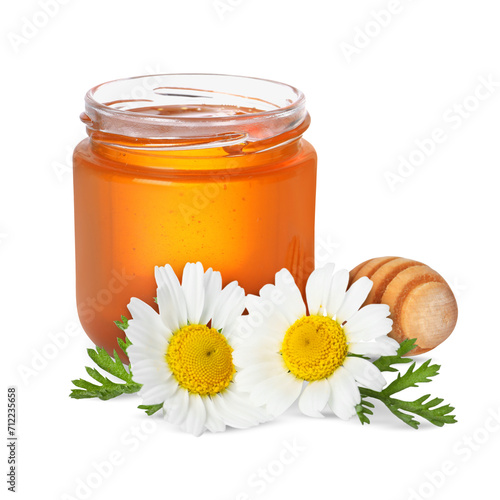 Honey in glass jar, dipper and chamomile flowers isolated on white