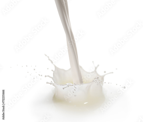 Fresh milk pouring and splashing on white background © New Africa