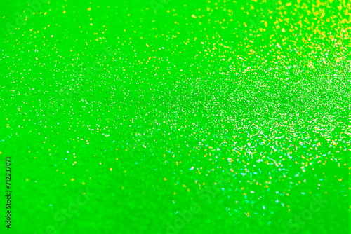 St. Patrick day. Shiny green glitter  closeup. Bokeh effect