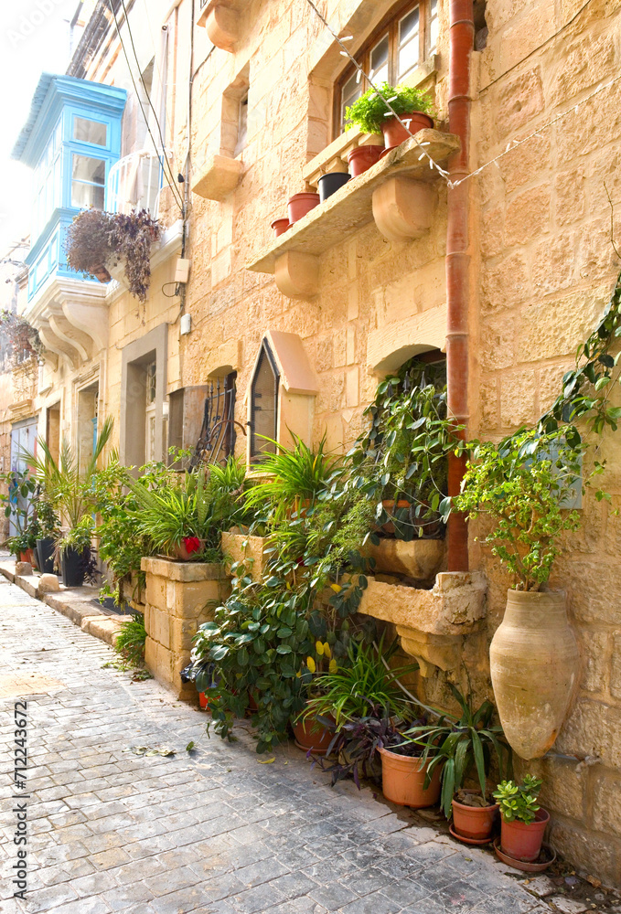 Narrow historical street in downtown of Rabat, Malta 