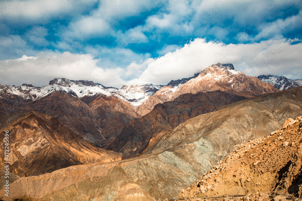 a huge mountain in the region of Tajikistan highly concentrated Rocky Mountains with no vegetation a huge mountain in the region of Tajikistan highly concentrated Rocky Mountains with no vegetation