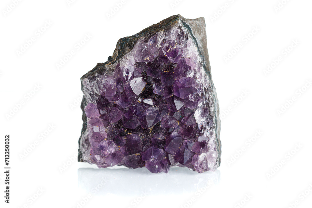 Amethyst mineral stone macro on white background Amethyst mineral stone macro on white background