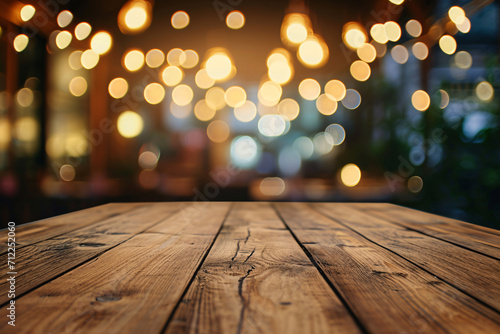 Empty wooden table top with blurry lights, bokeh blur background 