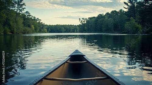 Tranquil Canoeing on Serene Lakes: Outdoor Harmony © MAY