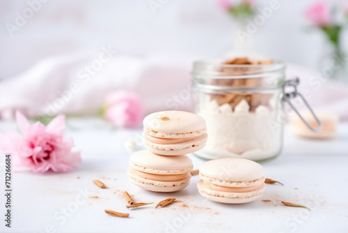 open macaron revealing creamy filling on glass surface