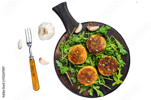 Veggie patty cutlet with lentils, vegetables and arugula. Transparent background. Isolated.