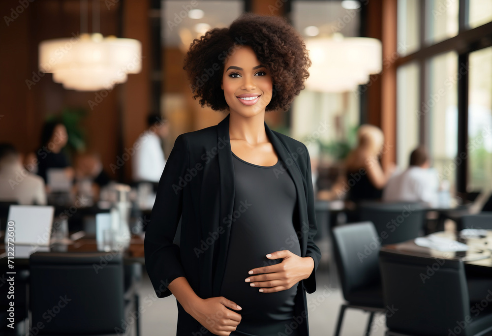 Pregnant businesswoman smiling at camera in a restaurant - obrazy, fototapety, plakaty 