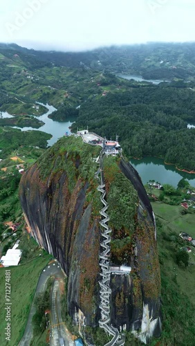 Close Aerial drone shot of El Penon de Guatape near Medellin, Colombia. Big Stone