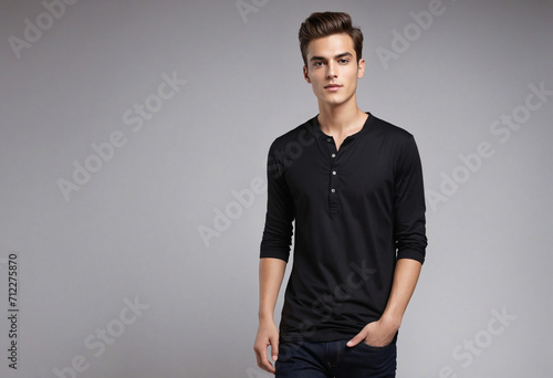 Stylish young man in black shirt. Trendy male model in dark casual attire.