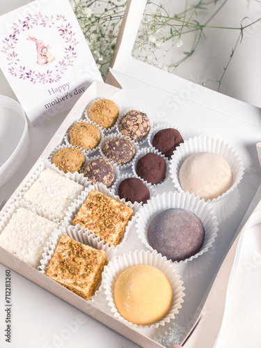 A gift set of bird's milk candies, truffles and mochi.