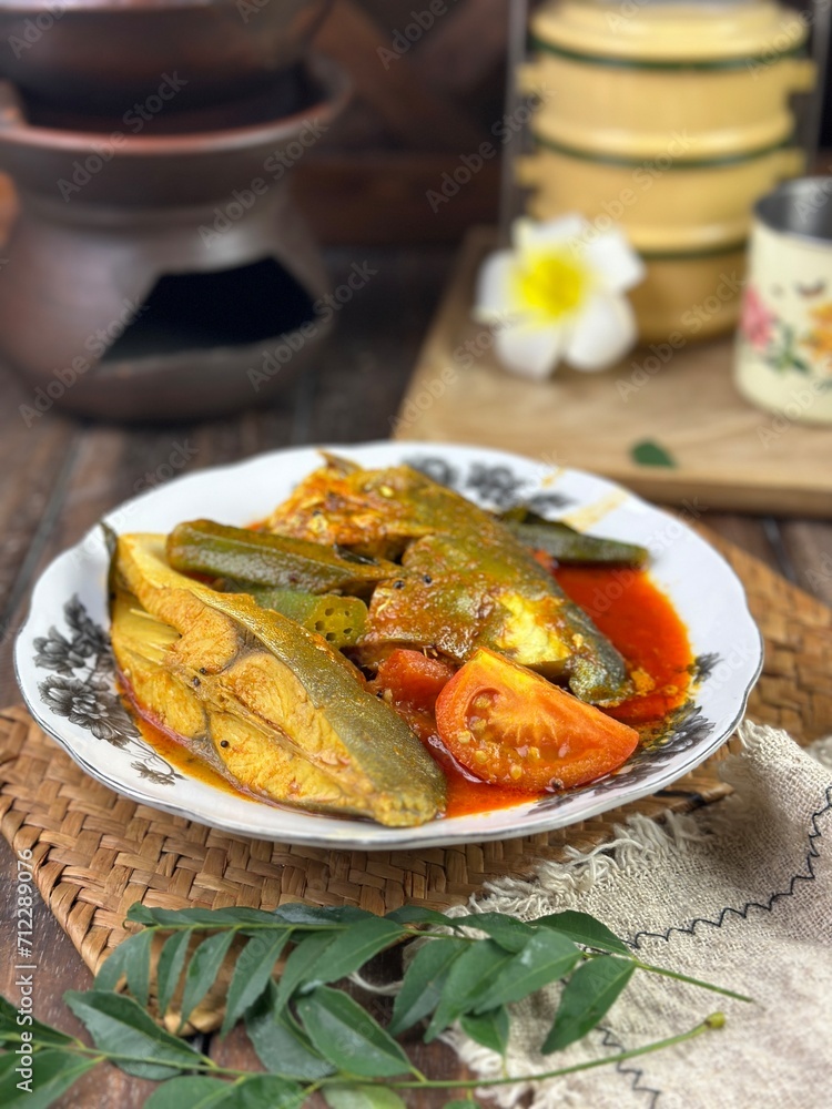 fish head curry or known as kari kepala ikan bawal is a famous Malaysian dish to eat with white rice