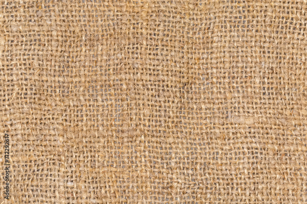 Texture of very coarse sackcloth woven from natural unpainted fibers Texture of very coarse sackcloth woven from natural unpainted fibers