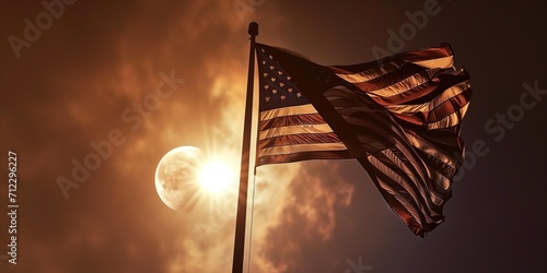 American Flag on the Flagpole and total solar eclipse photo