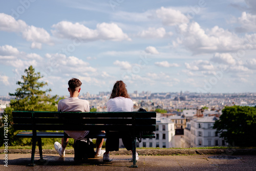 Fototapeta Naklejka Na Ścianę i Meble -  Couple of tourist enjoying the view of Paris, France