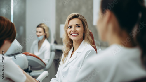 Women dentists are in the office together photo