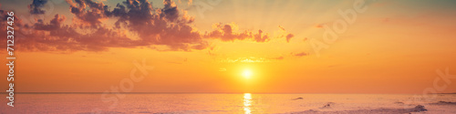 Seascape early in the morning. Sunrise over the sea. Natural landscape. Horizontal banner