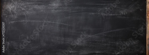 Blackboard background abstract texture of chalk rubbed out dark wall photo
