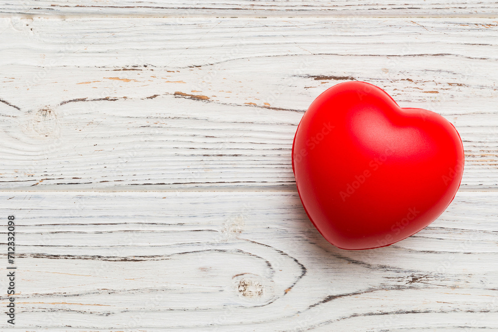 red heart shape on colored background. minimal concept top view with copy space red heart shape on colored background. minimal concept top view with copy space