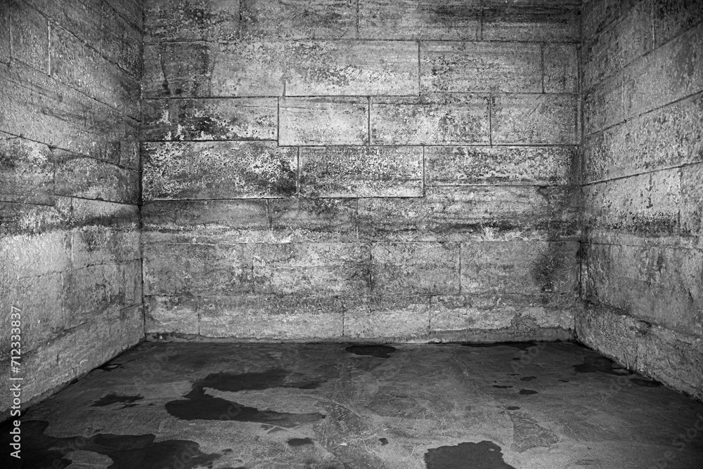 Old stone ruins inside. Stone halls and rooms of an old palace or dungeon.