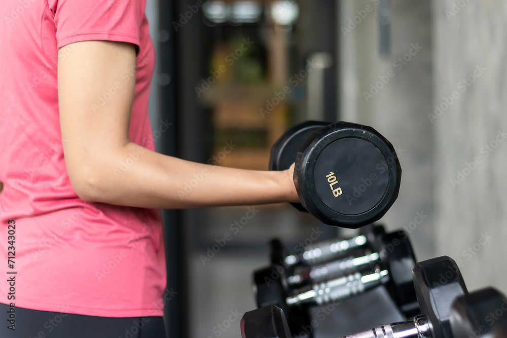 Rows of stainless dumbbell in the gym, Sports dumbbells in modern sports club. Rows of stainless dumbbell in the gym, Sports dumbbells in modern sports club.