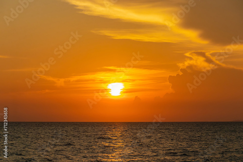 Beautiful sunset over the sea in Thailand. © Chalearmrat