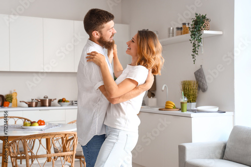 Happy couple in love dancin...