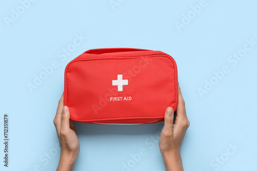 Female hands with first aid...
