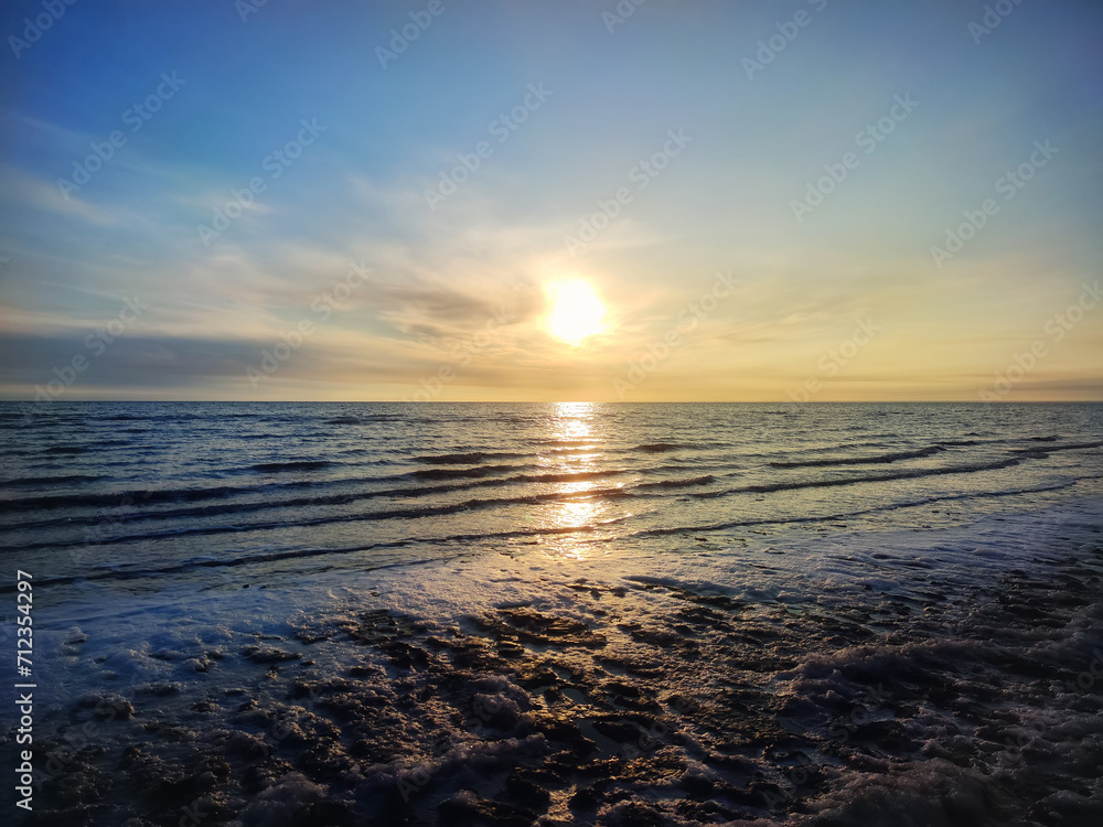 beautiful sunrise with a bright sun over the Aral Sea. in Karakalpakstan, Uzbekistan