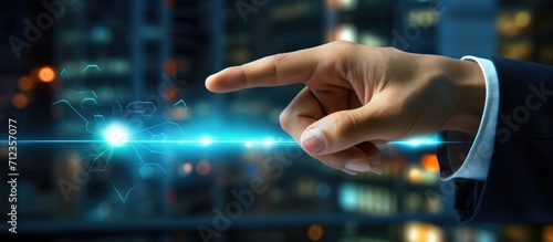 blurred background, Close up of hand pointing at screen with finger. Businessman concept