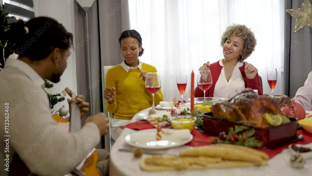 Family celebrating Christmas together eating homemade food. Family celebrating Christmas together eating homemade food.