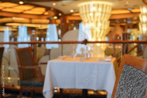 Art Deco interior design style furniture, carpets and paneling onboard classic ocean liner cruiseship cruise ship main dining room restaurant