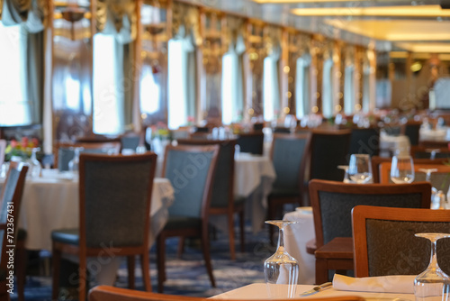 Art Deco interior design style furniture, carpets and paneling onboard classic ocean liner cruiseship cruise ship main dining room restaurant photo