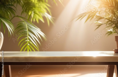 Empty blank marble tabletop on a beige wall, beautiful floral tropical shadow. Minimalistic backdrop for product presentation, podium, pedestal. Showcase, display case. Minimal abstract background.