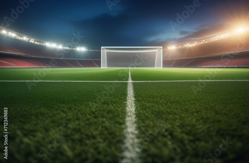 Soccer field background with illumination  green grass and cloudy sky. European football arena with white goal post  blurred fans at playground view. Outdoor sport  championship  match  game space