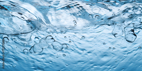 The surface of the water. Movement. white background. Close-up view