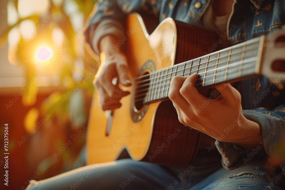 Close up of hands of musician played the guitar in sunlit room, Good lifestyle with music and relax with friends, family club