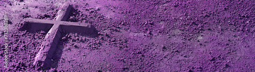 Ash Wednesday wide banner with imprint of cross drawn in purple ash. symbolic imprint of a cross in vibrant purple sand, depicting Ash Wednesday reflection and penance. photo