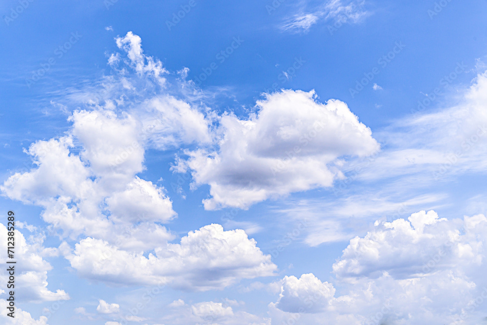 White clouds in a bright blue sky. The beauty of the nature White clouds in a bright blue sky. The beauty of the nature