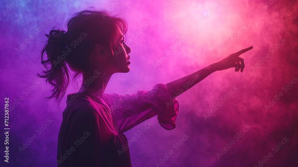 Woman points to the side black background purple colors neon