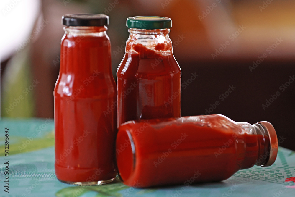 Fresh tomato juice in bottles. Fresh tomato juice in bottles.