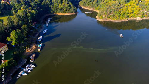 Aerial view of Orlik castle over Orlik reservoir. Beautiful gothic landmark over the lake. Orlik nad Vltavou, South Bohemia, Czech republic.