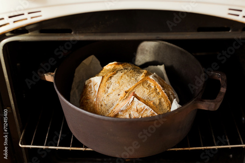 Freshly baked sourdough bread cast iron