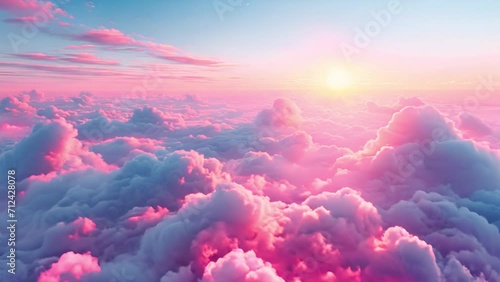 Above magical pink clouds with sunset. Aerial majestic sunrise above amazing cloudscape with sun light heavenly shining through golden clouds. Paradise clouds slow motion at pink sunset. Nature enviro photo