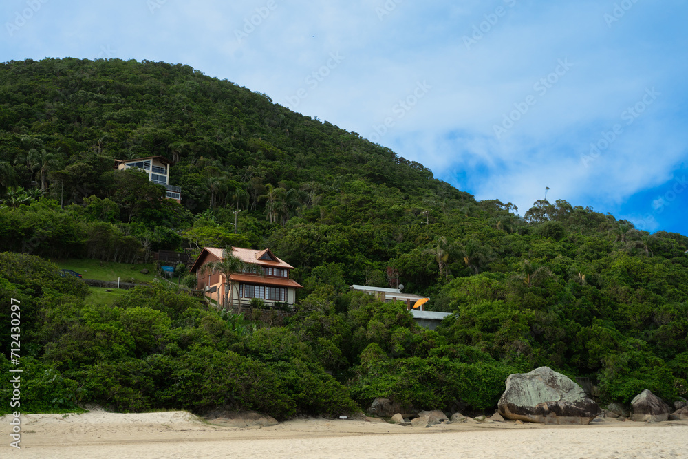 Houses overlooking the sea on the mountain facing the beach in Brazil
