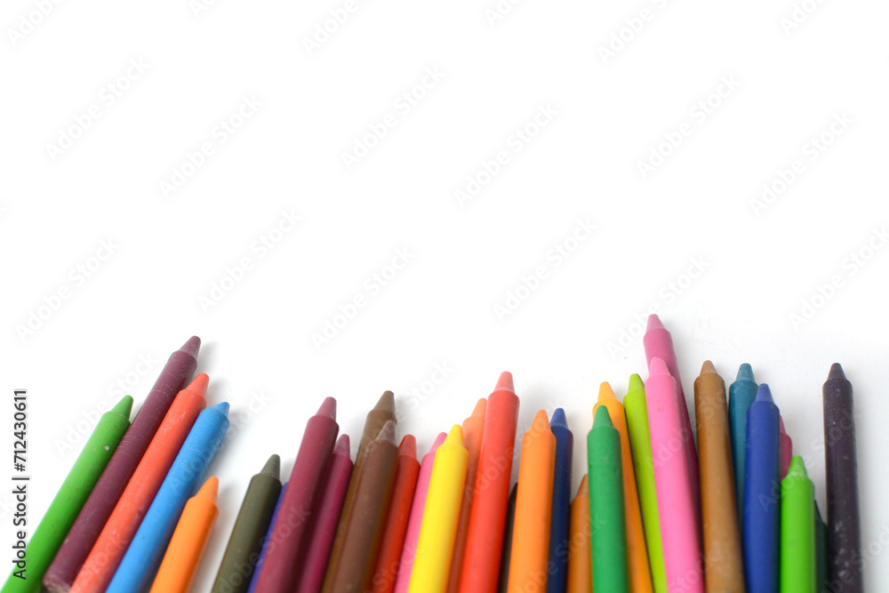 Crayons lined up isolated on white background. Crayons lined up isolated on white background.