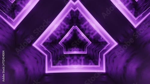 Tunnel with purple light going through it. Kaleidoscope VJ loop. photo