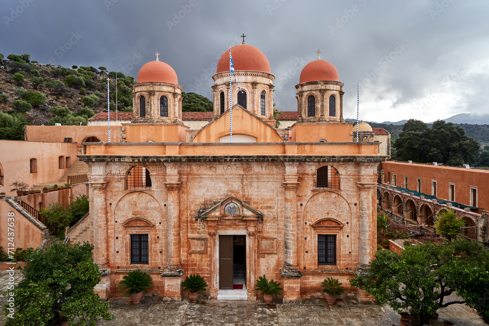 Facade of a historic Orthodox church in the historic monastery of Agia Triada on the island of Crete